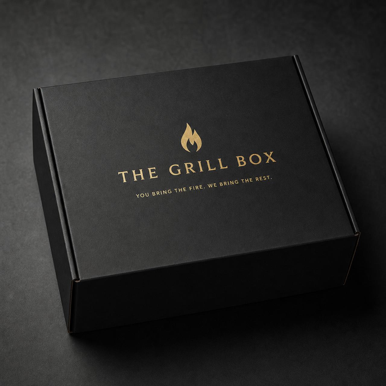 The Grill Box matte black insulated box with warm gold branding